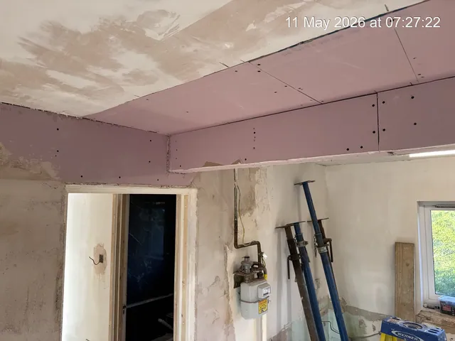Boarding around the beam during interior preparation