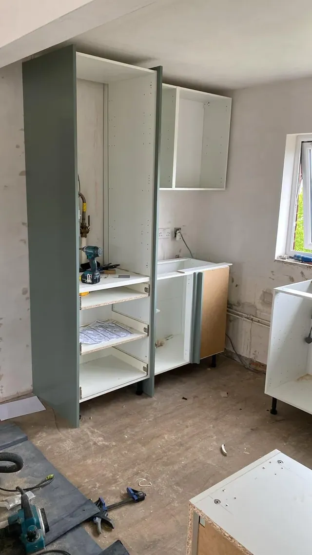 Kitchen cabinets during installation