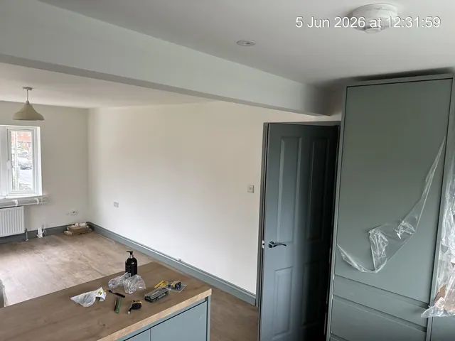 Kitchen and living area during the final decorating and fitting stage