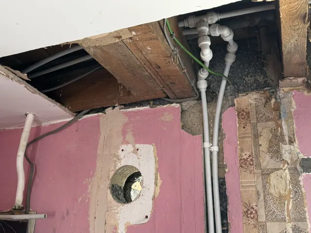 Ceiling opened to provide access for pipework during the refurbishment